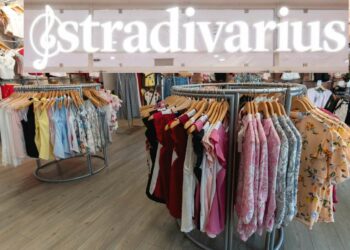 El elegante vestido camisero de efecto piel de Stradivarius: estilo y ahorro en una prenda única